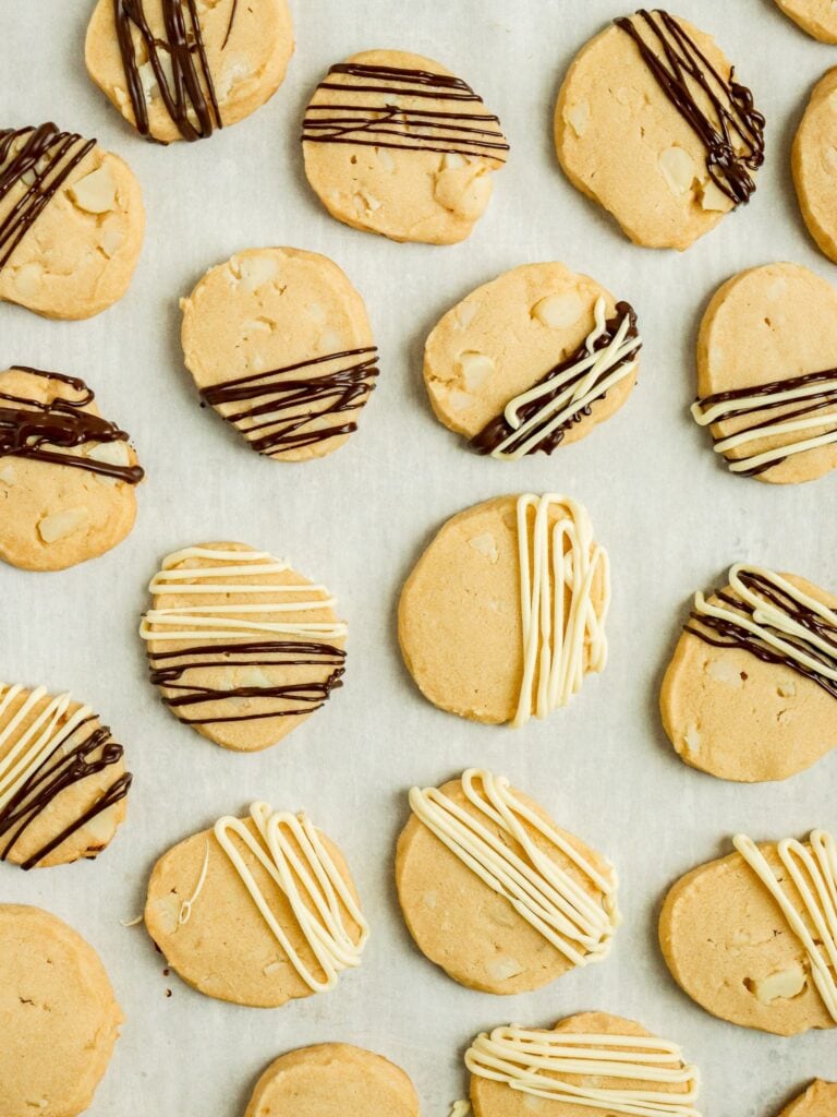shortbread cookies with drizzled dark and white chocolate on top