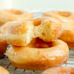 stack of glazed yeast doughnuts