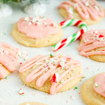 soft peppermint sugar cookies topped with pink peppermint icing