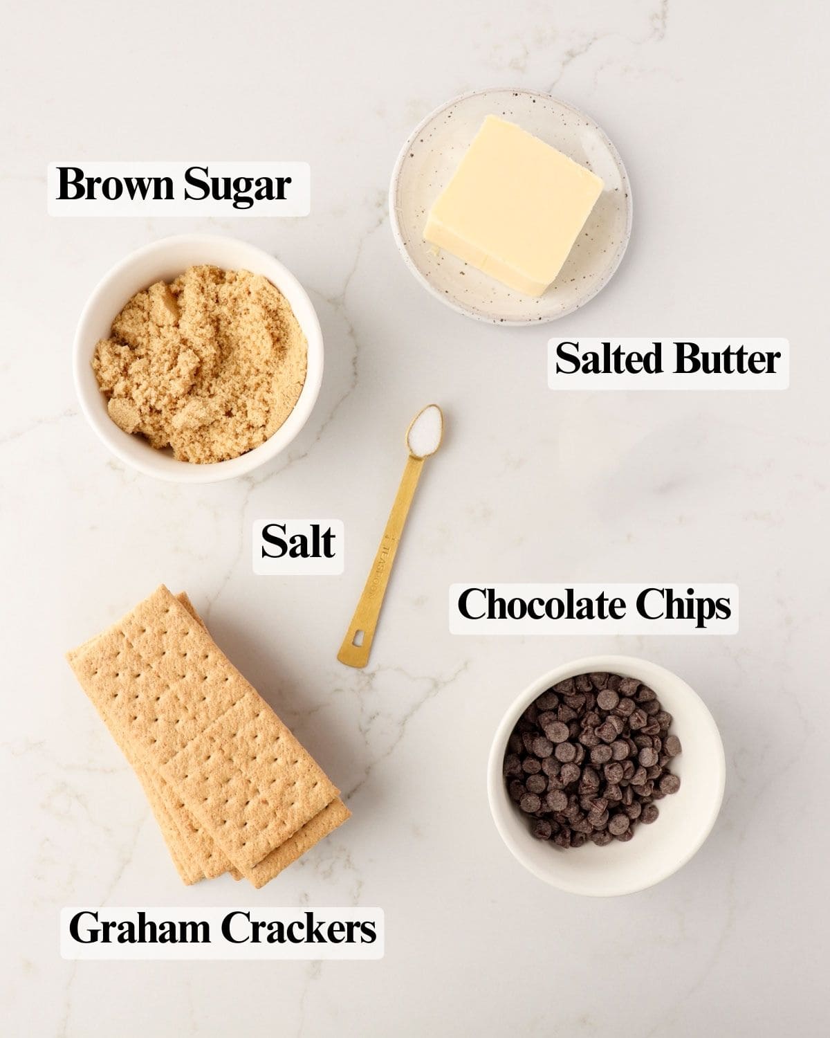 Ingredients for graham cracker toffee: salted butter, brown sugar, salt, graham crackers, and chocolate chips.