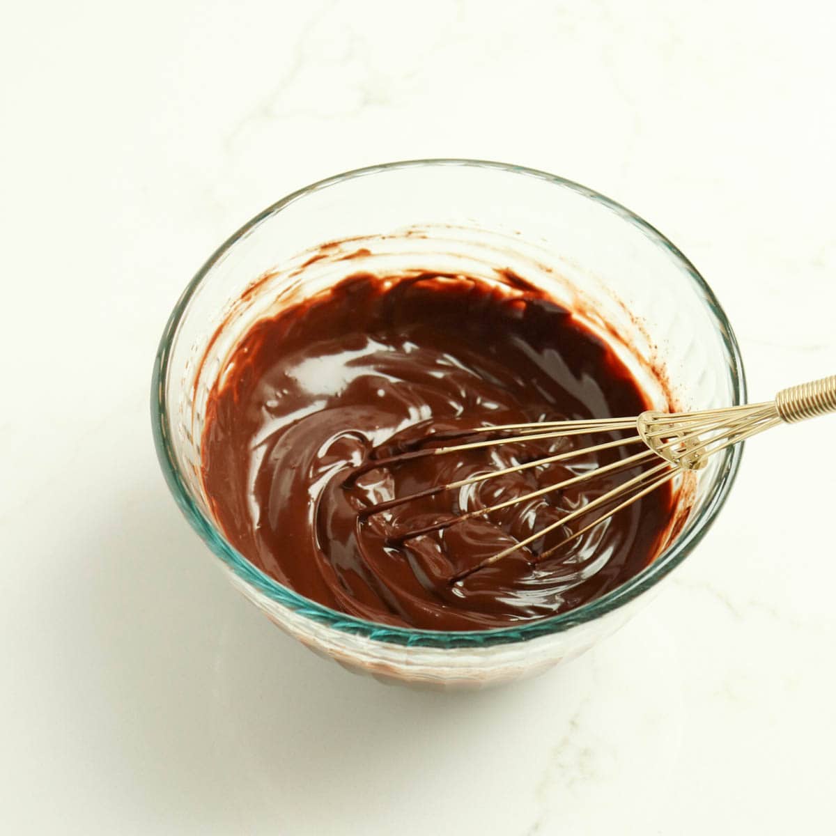 Whisked ganache in a bowl.