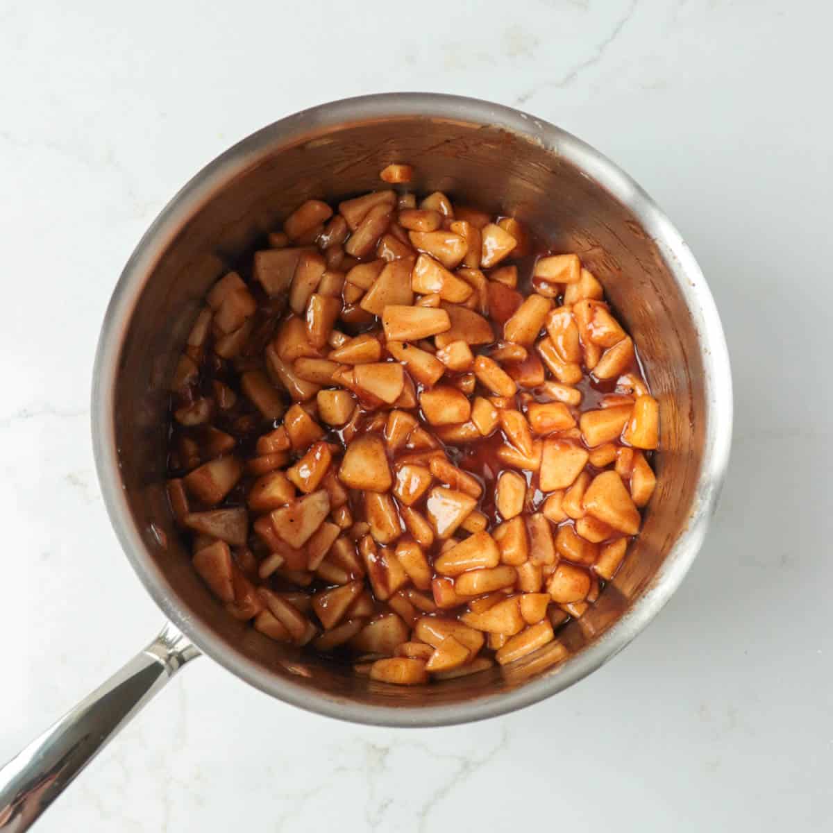 Cooked apple pie filling.