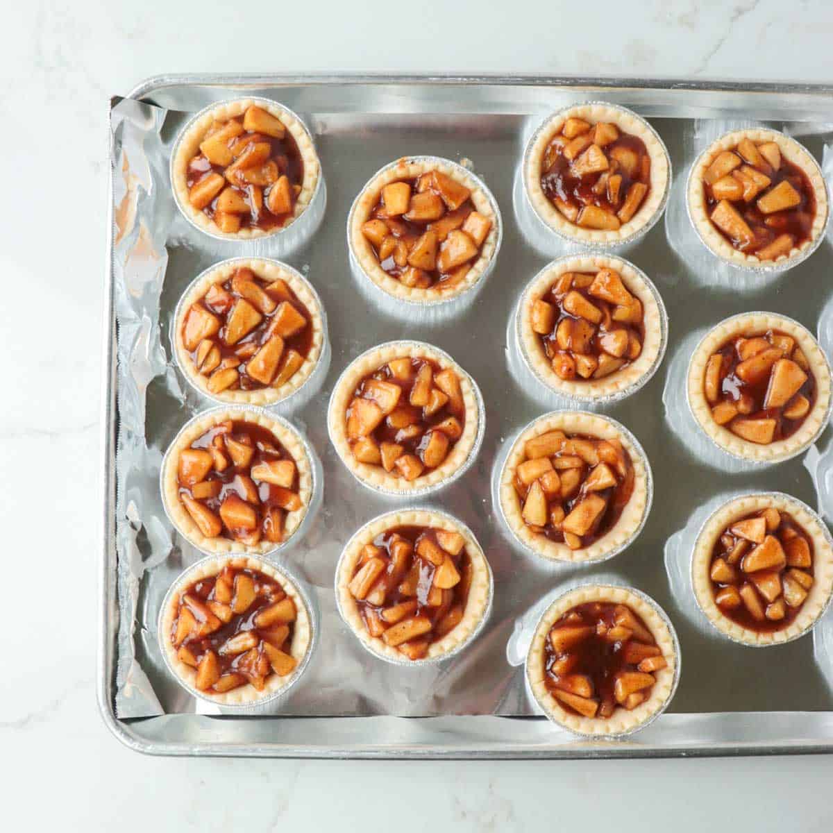Apple tarts before baking.