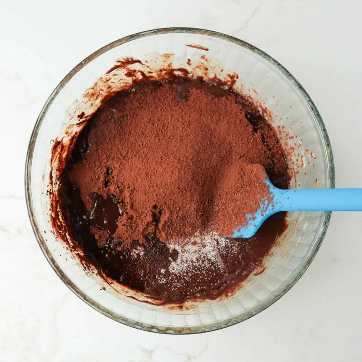 Cocoa, vanilla, and salt added to fudge.