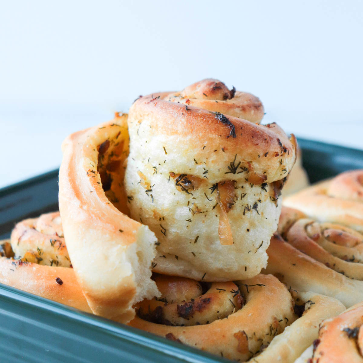 Unrolled dinner roll to show interior filling.