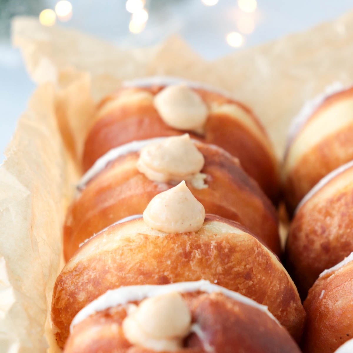Eggnog doughnuts in a pan.