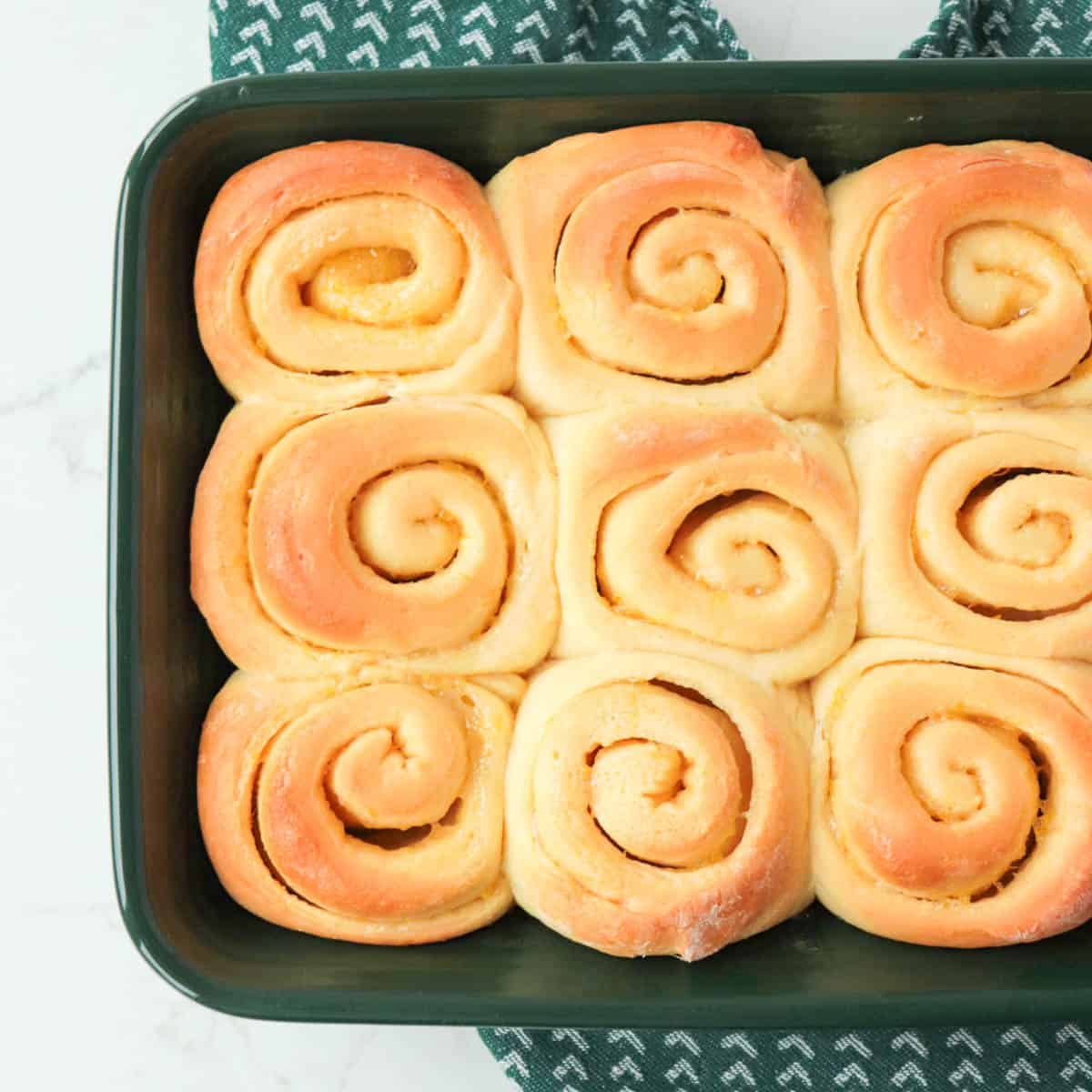 Baked rolls in a baking dish.
