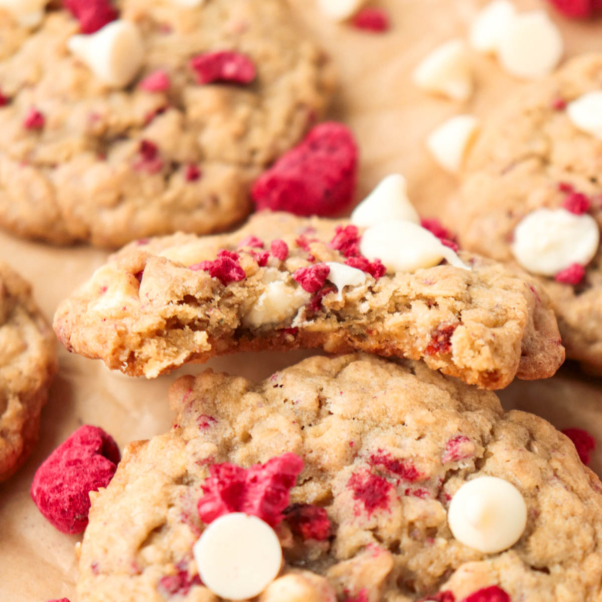 Baked cookie topped with freeze-dried berries and white chocolate chips.