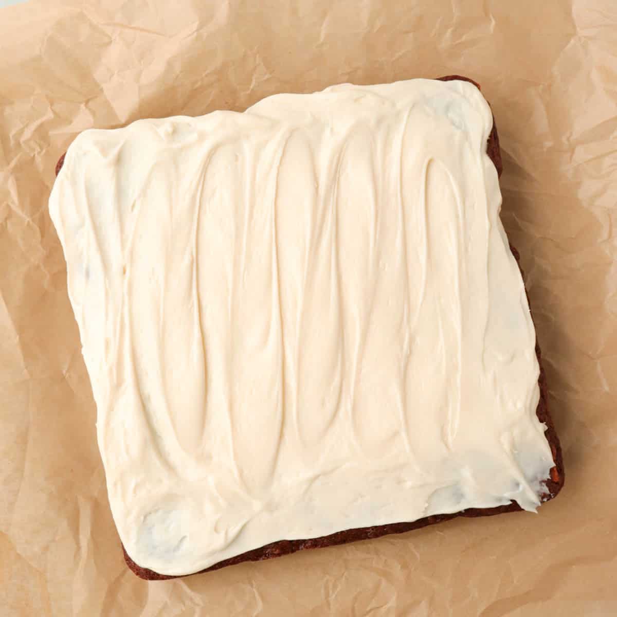 Icing spread onto the cake.