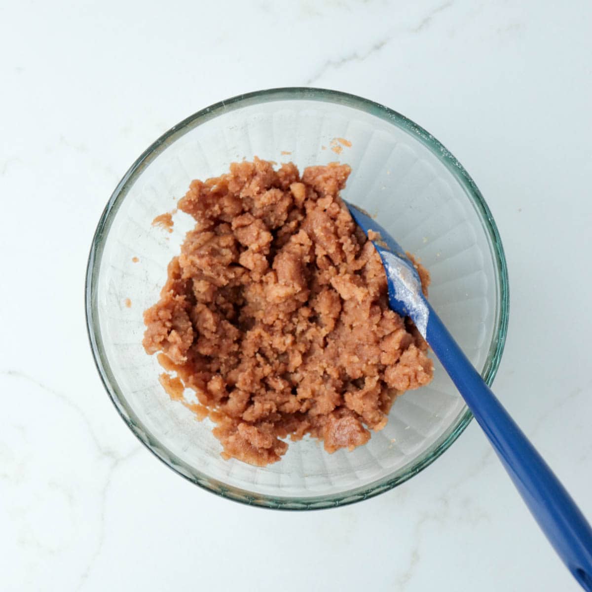 Streusel stirred together in a small mixing bowl.