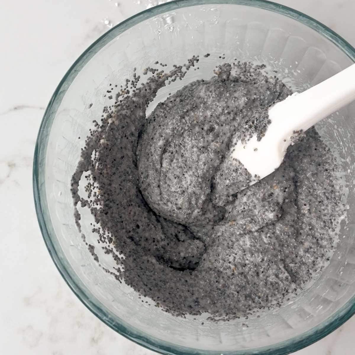 Poppy seed filling in a glass bowl.