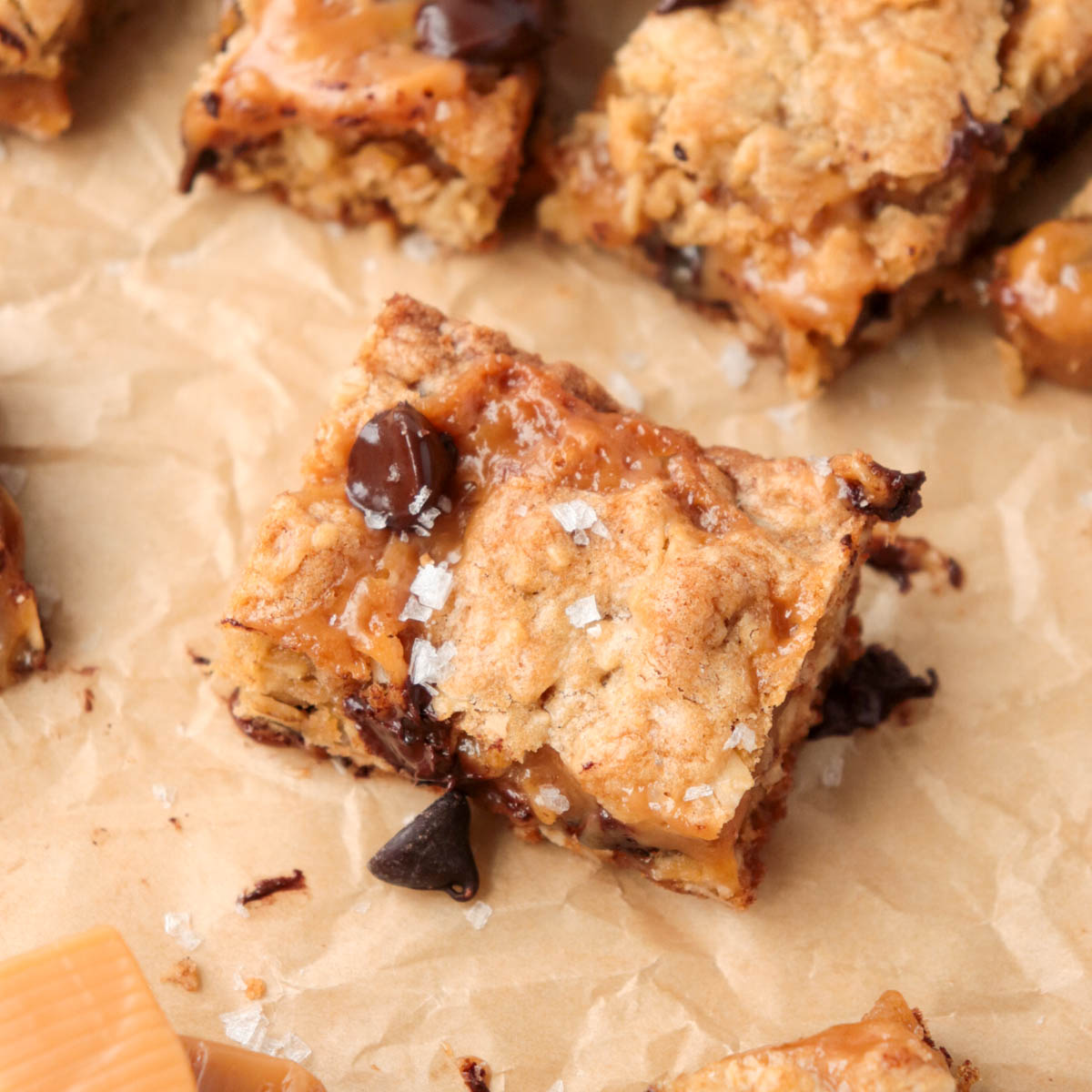 Oatmeal chocolate chip bar with caramel inside and sea salt flakes on top.