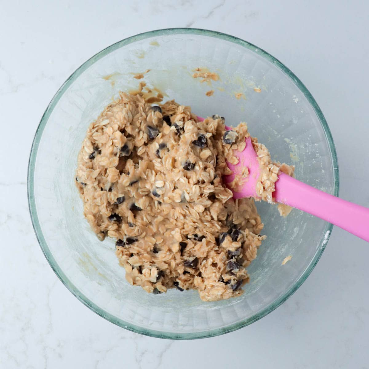 Oatmeal chocolate chips batter mixed together.