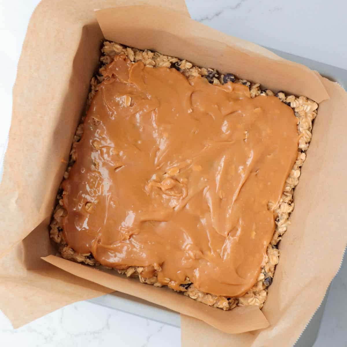 Caramel mixture spread over top of oatmeal batter.