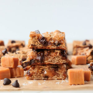 Stack of salted caramel oatmeal chocolate chip bars.