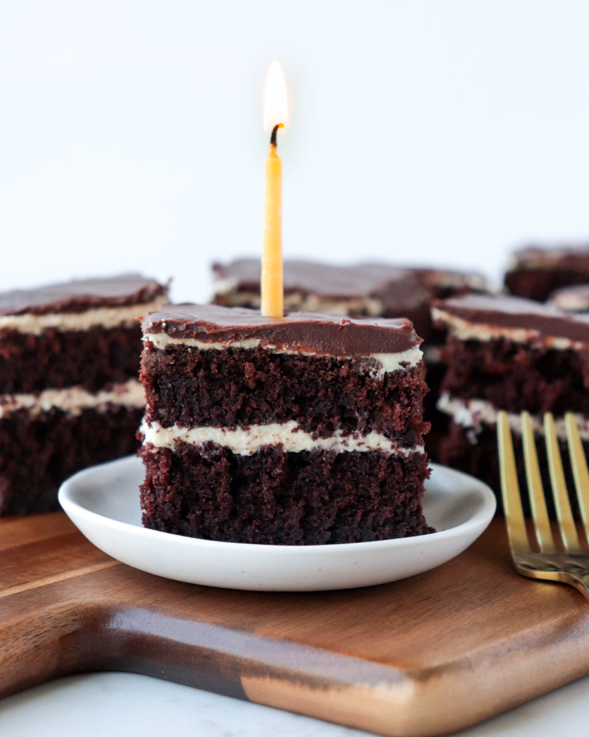 Chocolate cake with layers of tahini frosting and chocolate ganache.