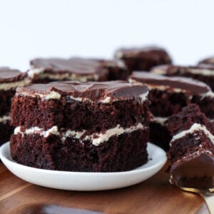 Chocolate cake with layers of tahini frosting and chocolate ganache.