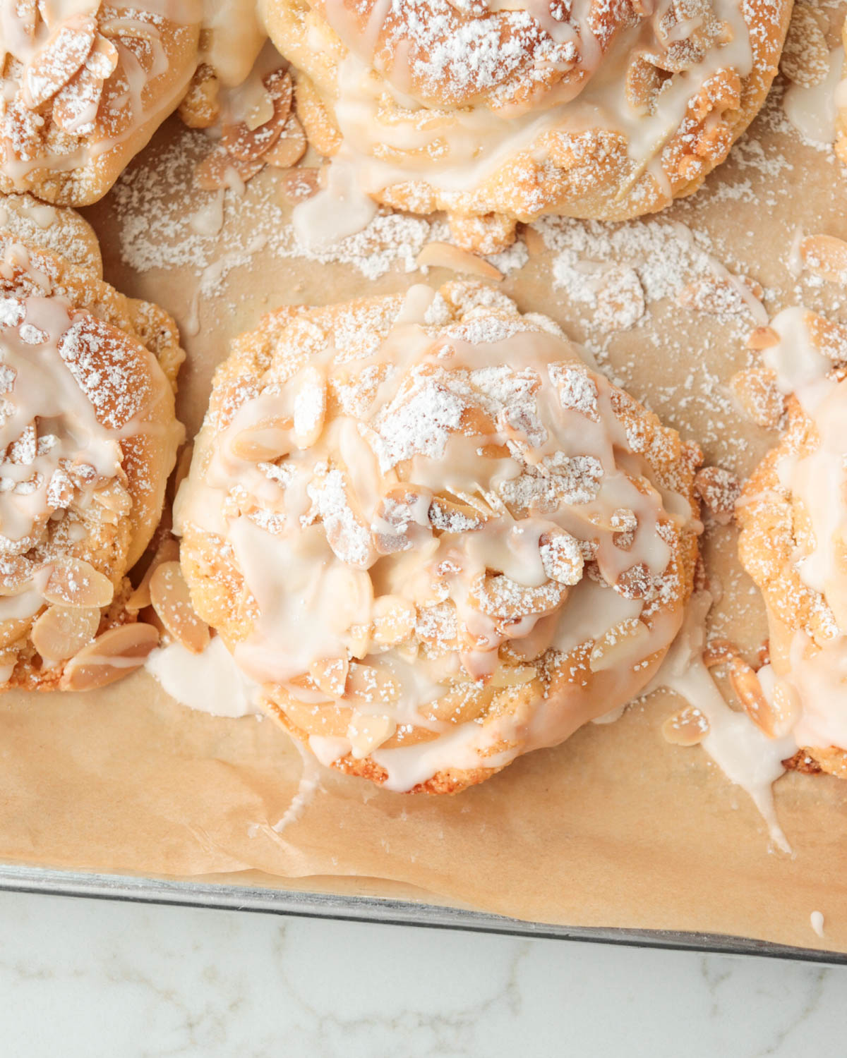 Almond bun on a pan.
